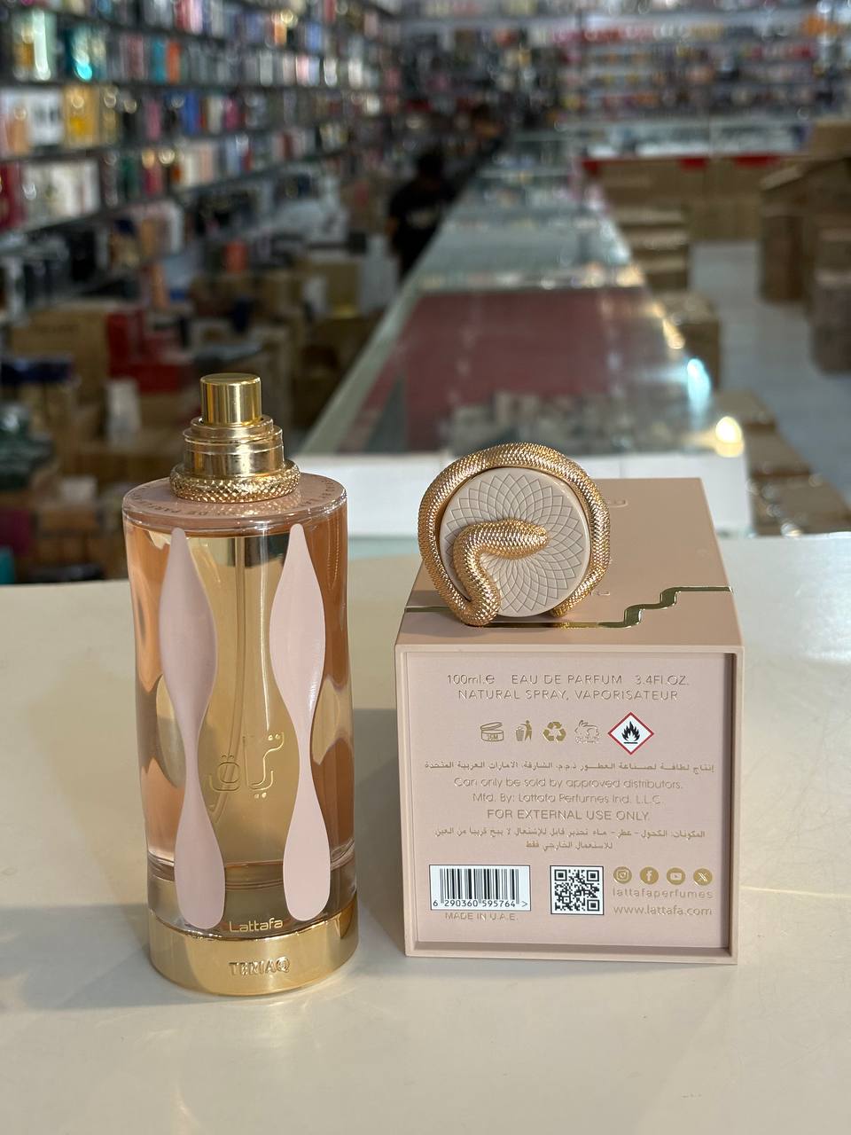 ادو پرفیوم لطافه تریاق TARYAQ یونیcex شیرین و گرم 100ml