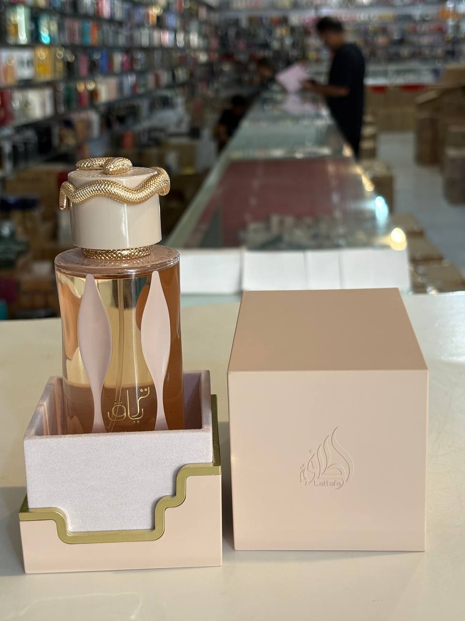 ادو پرفیوم لطافه تریاق TARYAQ یونیcex شیرین و گرم 100ml