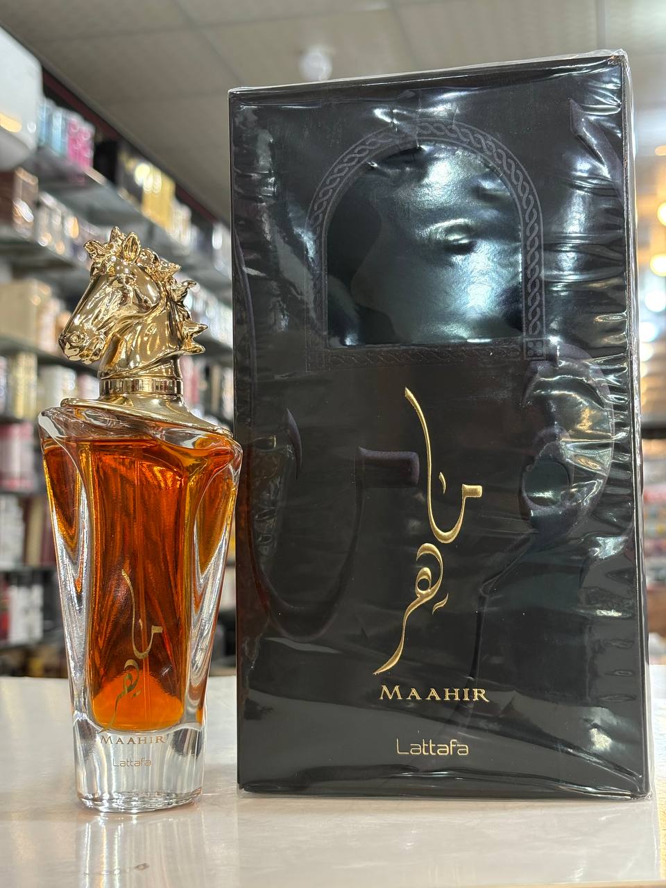ادو پرفیوم زنانه لطافه ماهر طلایی MAAHIR GOLD 100ml گلی میوهای