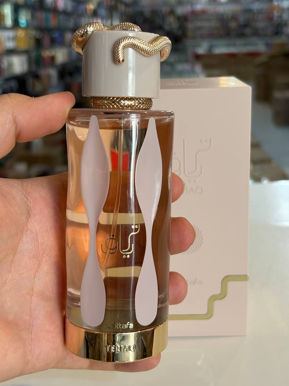 ادو پرفیوم لطافه تریاق TARYAQ یونیcex شیرین و گرم 100ml