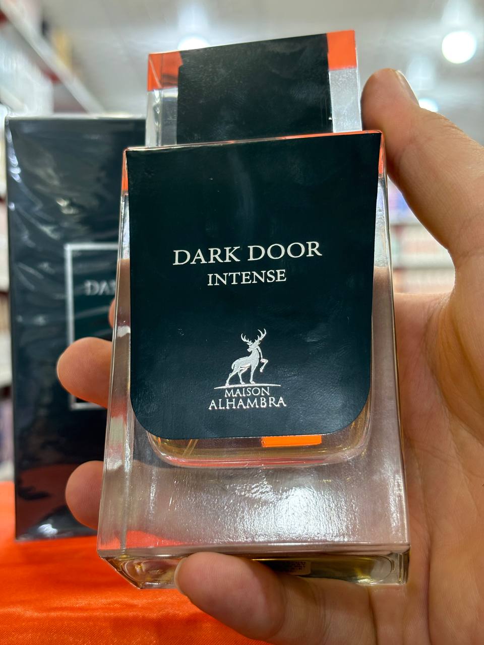 عطر ادوپرفیوم مردانه الحمبرا مدل دارک دور اینتنس رایحه شیرین حجم 100 میلی لیتر