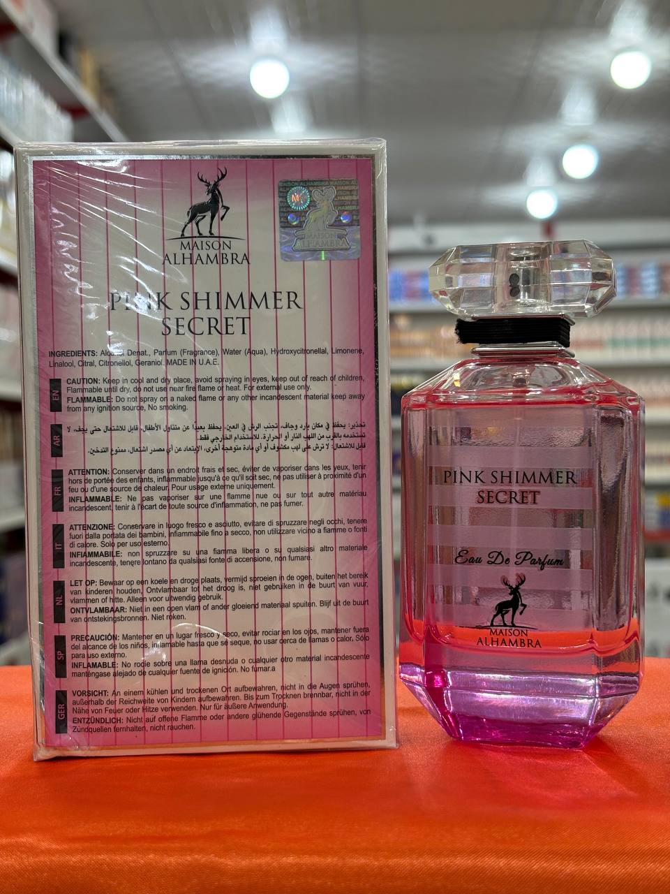 عطر ادوپرفیوم الحمبرا مدل پینک شیمر سکرت رایحه شیرین زنانه 100 میلیلیتر