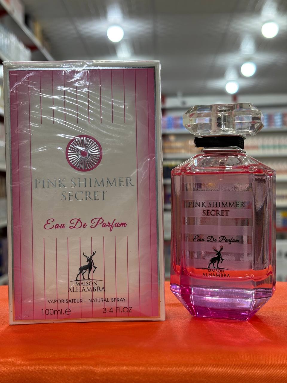 عطر ادوپرفیوم الحمبرا مدل پینک شیمر سکرت رایحه شیرین زنانه 100 میلیلیتر
