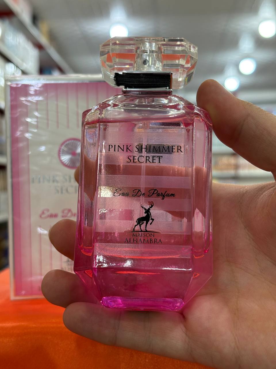 عطر ادوپرفیوم الحمبرا مدل پینک شیمر سکرت رایحه شیرین زنانه 100 میلیلیتر