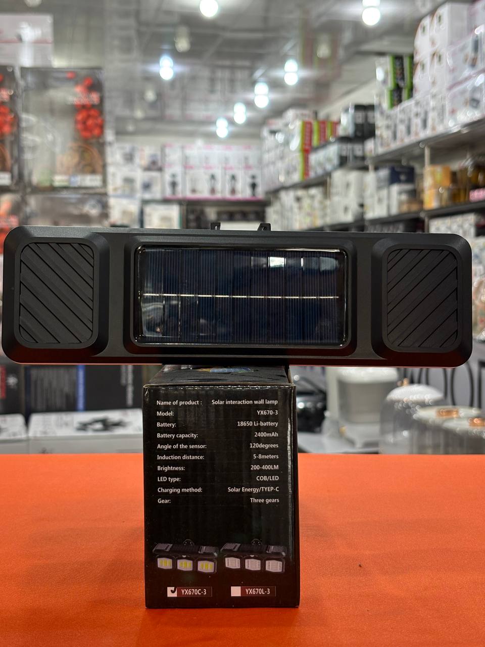 چراغ شارژی خورشیدی دیواری سنسور دار 38 وات ضد آب مدل YX670C-3