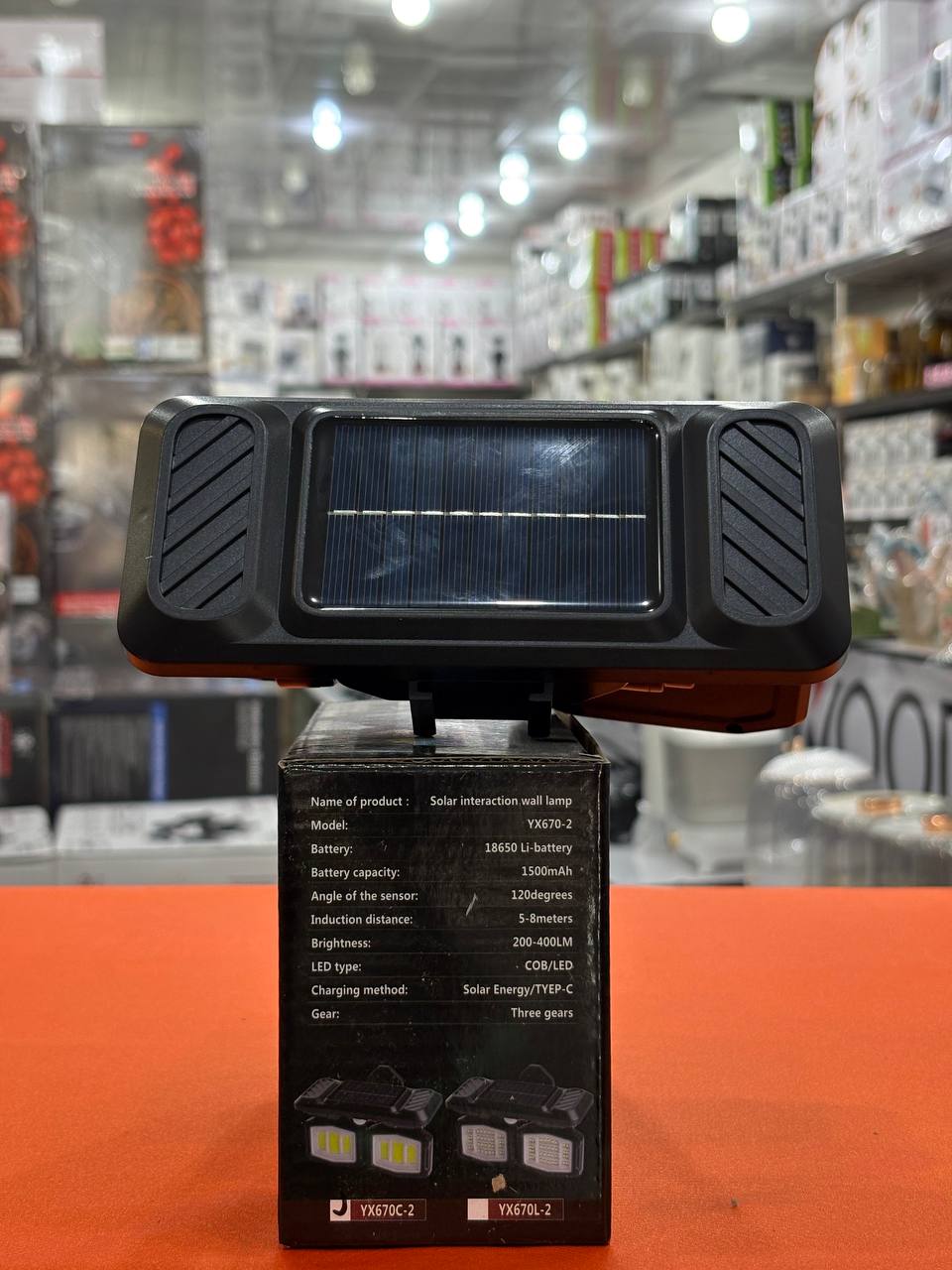 چراغ شارژی خورشیدی دیواری سنسور دار 28 وات ضد آب مدل YX670C-2