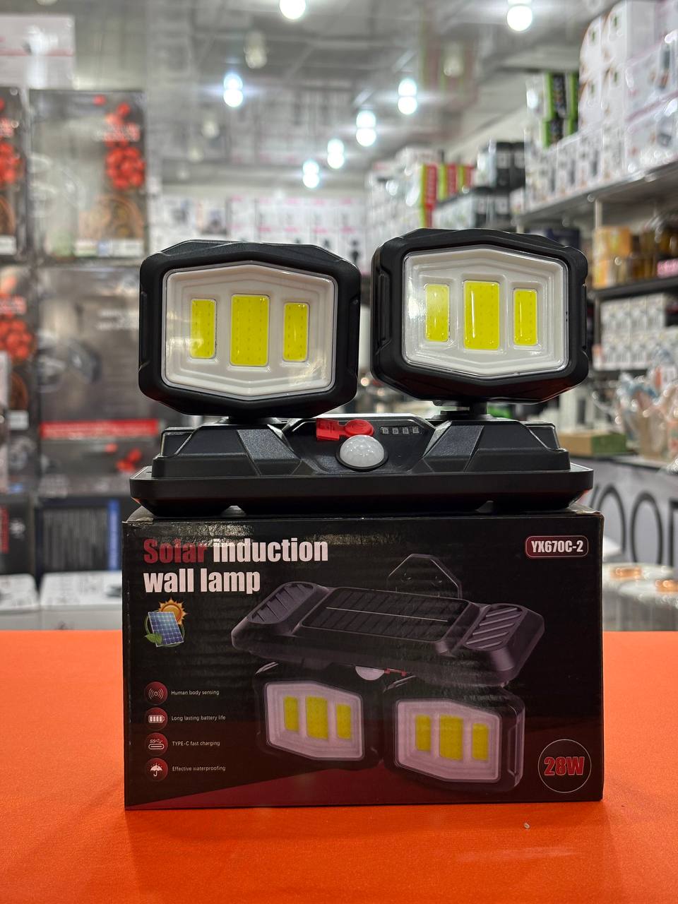 چراغ شارژی خورشیدی دیواری سنسور دار 28 وات ضد آب مدل YX670C-2