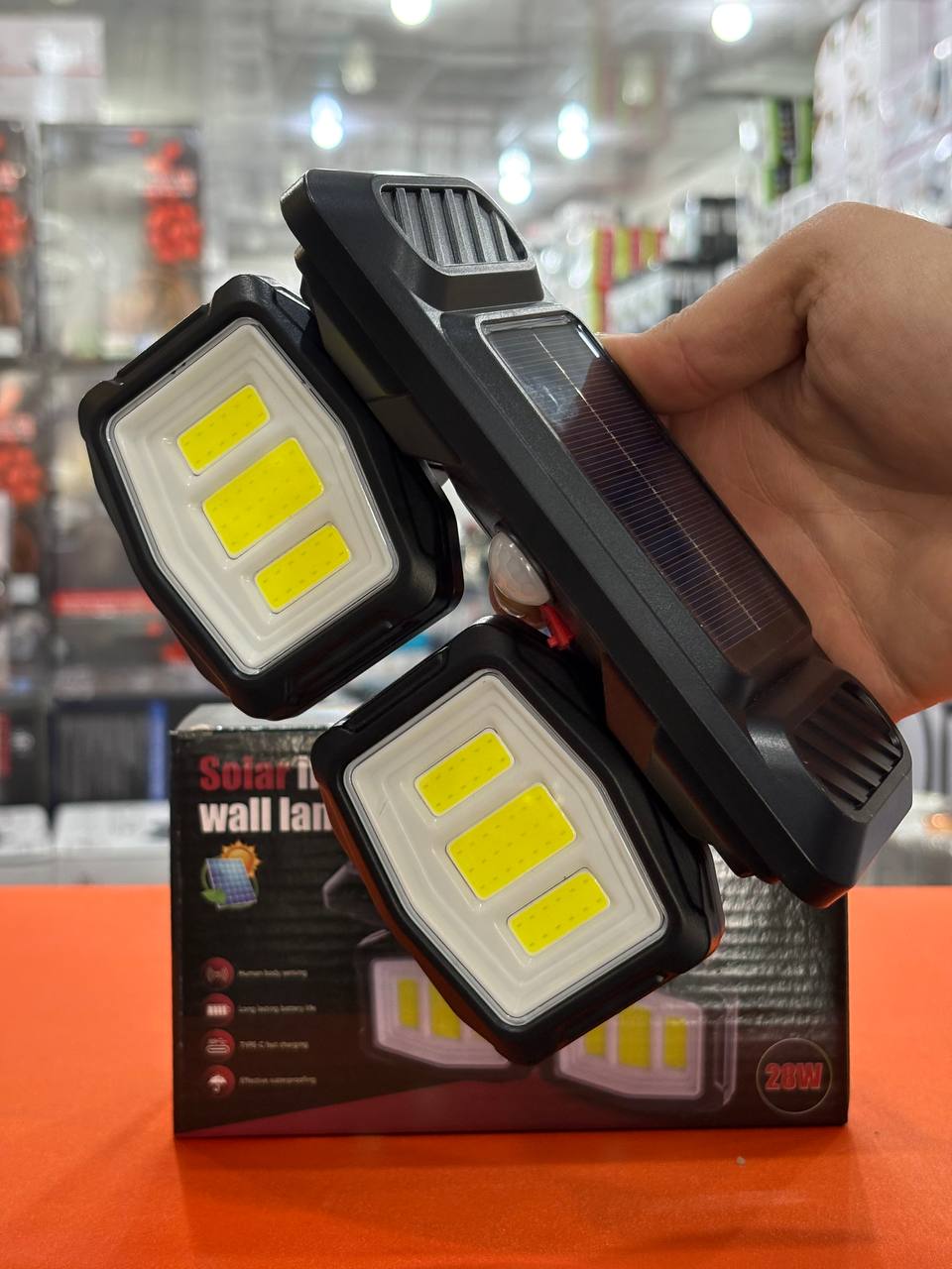 چراغ شارژی خورشیدی دیواری سنسور دار 28 وات ضد آب مدل YX670C-2