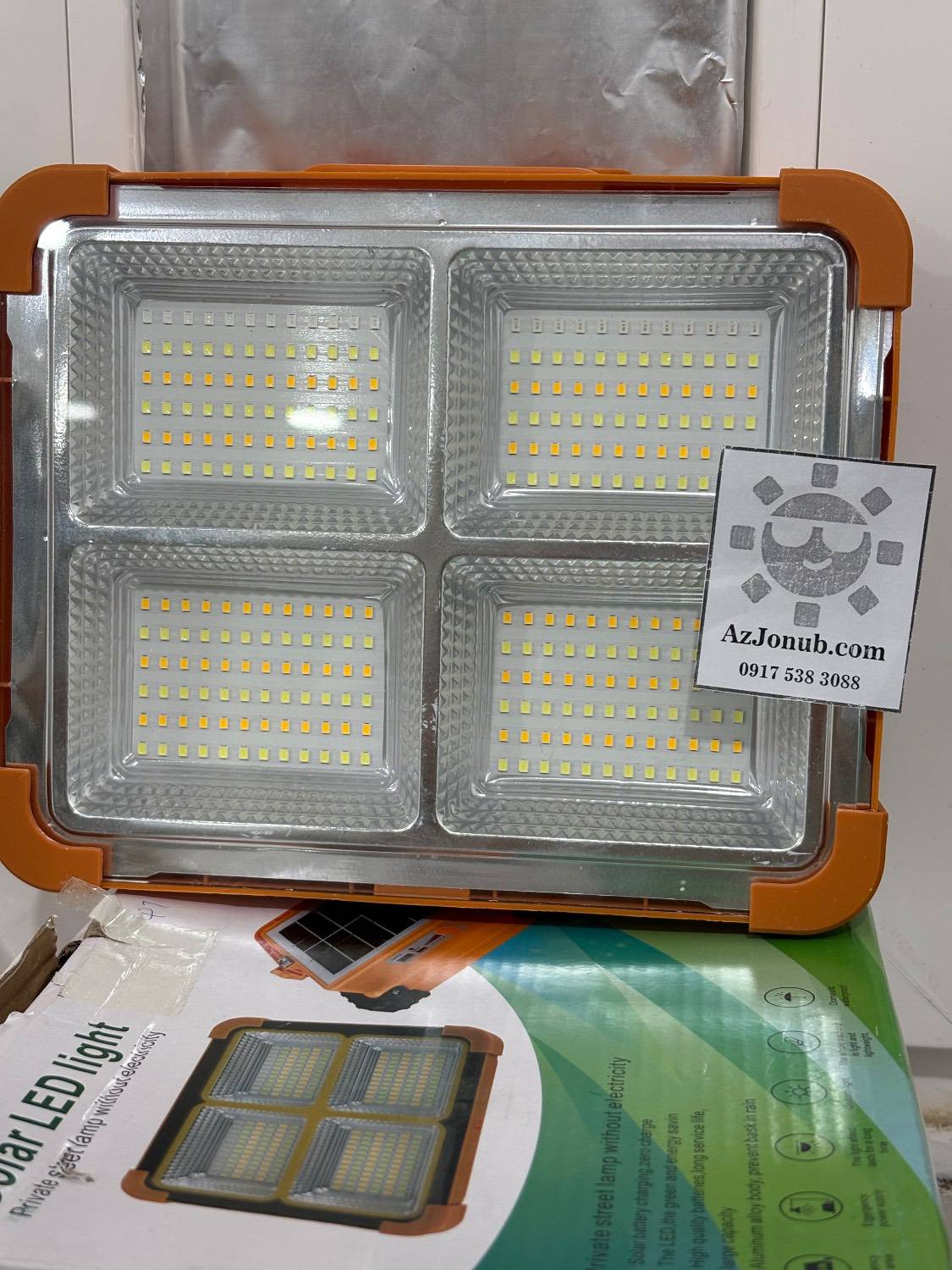 پروژکتور و لامپ شارژی پاوربانکی 300 وات با پنل خورشیدی ۴ خانه دارای ۲۸۸ ال ای دی 4 Cell Solar LED Light Projector